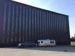 In front of one of the massive Jim Beam Distillery Warehouses, Big T and Ducky patiently wait for the rest of Team Gritty to finish sampling the wondrous line of libations at the Jim Beam Distillery, Clermont, Kentucky