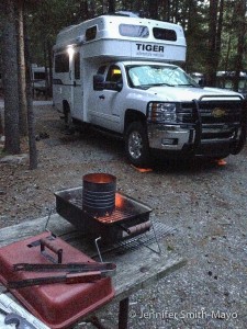 Team Gritty preps a charcoal fire in the hibachi, Acadia National Park, Mount Desert Island, Maine