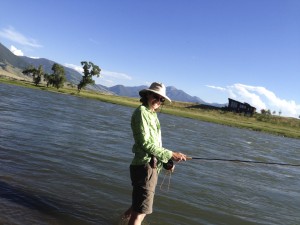 Jen fly fishes on the Yellowstone River, Loch Leven Fishing Access, Livingston, Montana