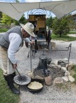 Top cookie Ron Reed whips up a stellar feed of sourdough biscuits and cowboy coffee outside Buffalo Bill Center of the West, Cody, Wyoming