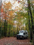 Snowy camps under a canopy of fall foliage at Camden Hills State Park, Camden, Maine